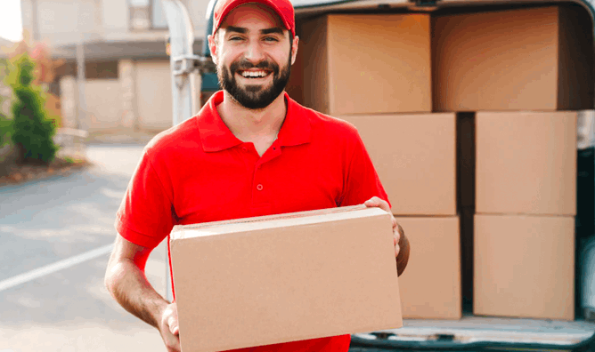 Delivery driver with shipping boxes – fast and reliable electrical distribution logistics service.
