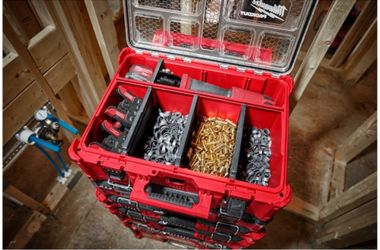 Milwaukee PACKOUT organizer loaded with electrical fasteners, anchors, and mounting hardware for jobsite distribution and installation tasks.