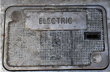 Metal underground electrical utility enclosure for power access and infrastructure protection.